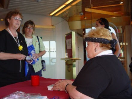 Jeanne Signs Autographs